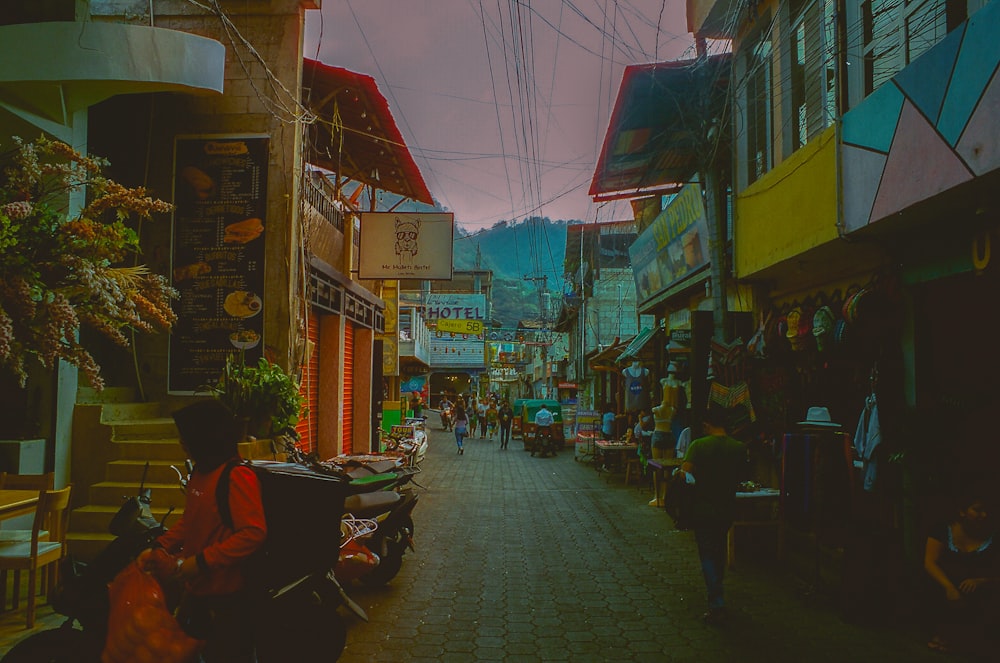 a street with people and shops