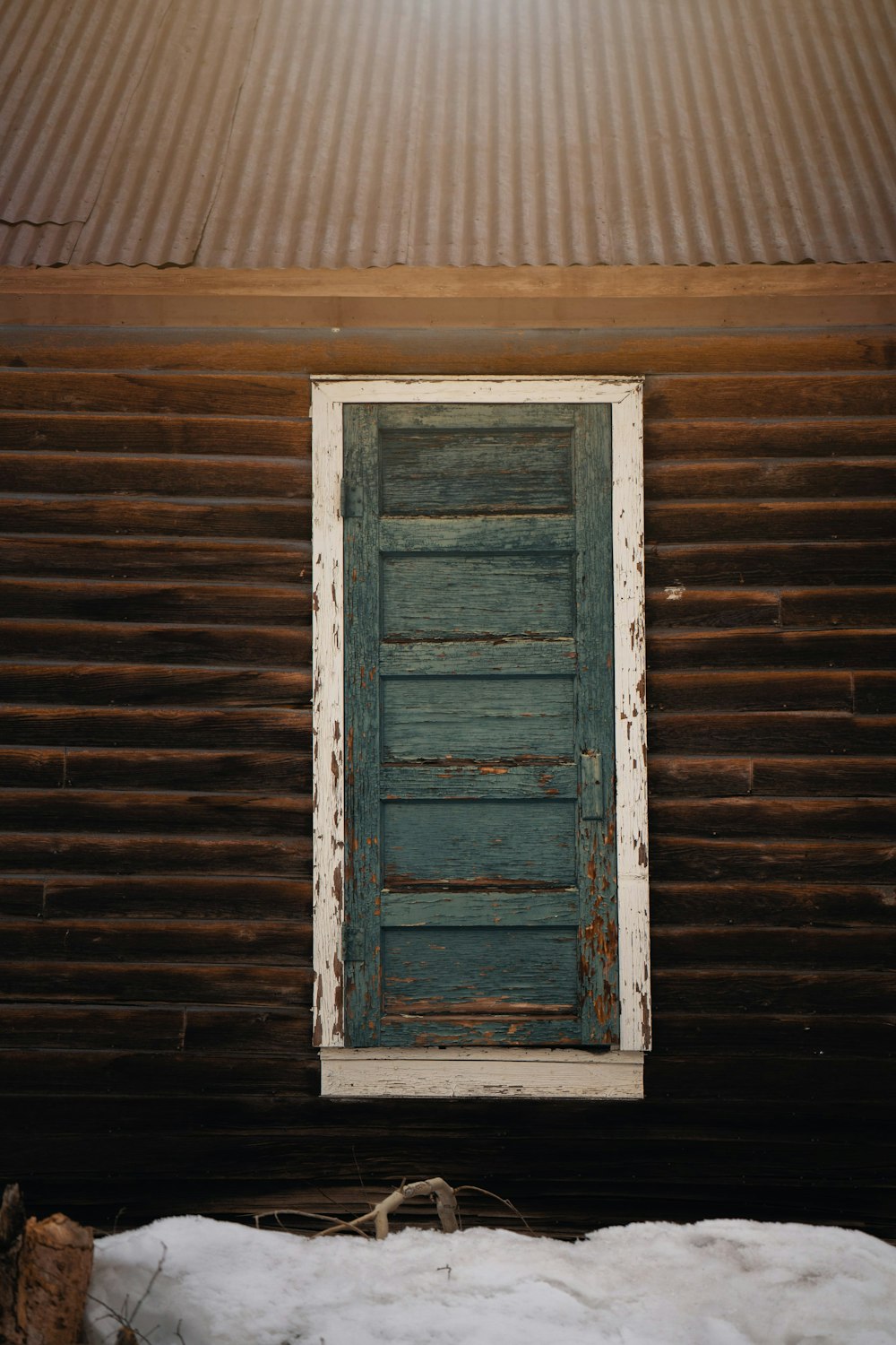 a window in a wooden building