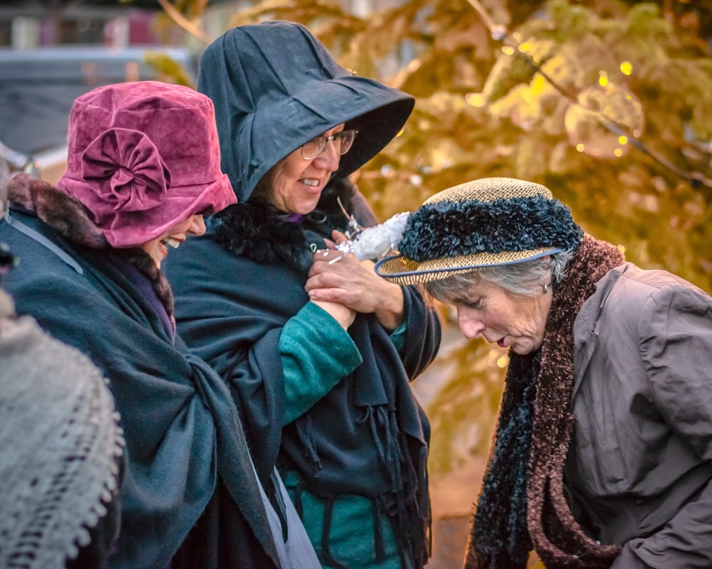 a group of people wearing hats