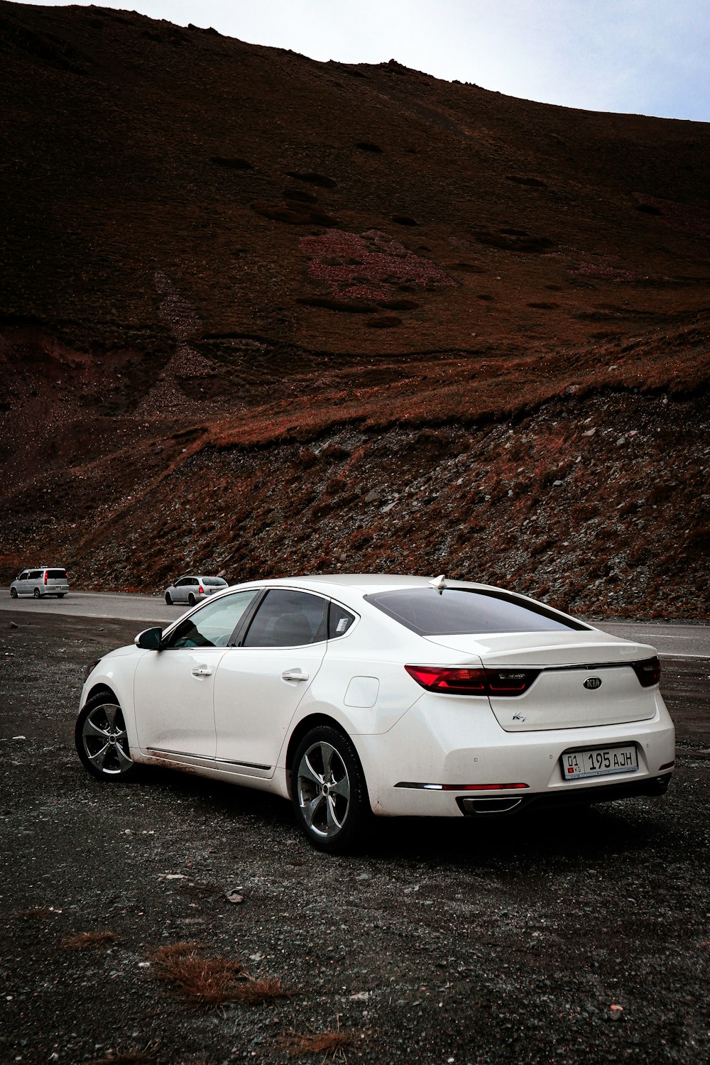 a white car parked on a road