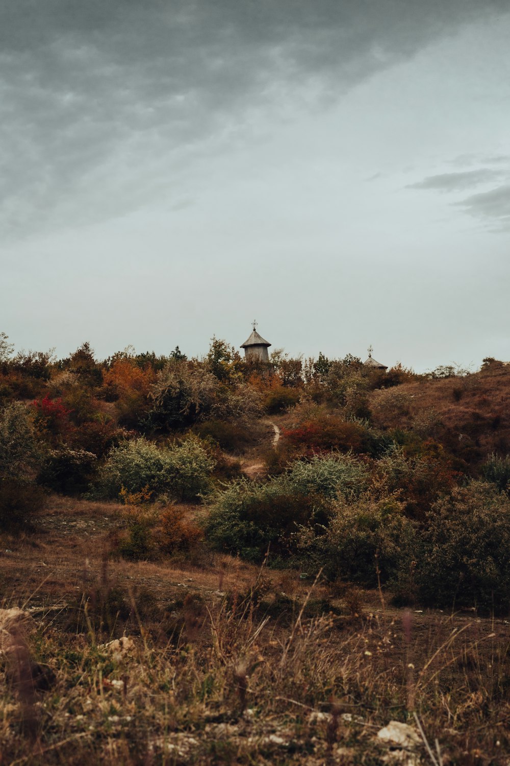 a small tower on a hill