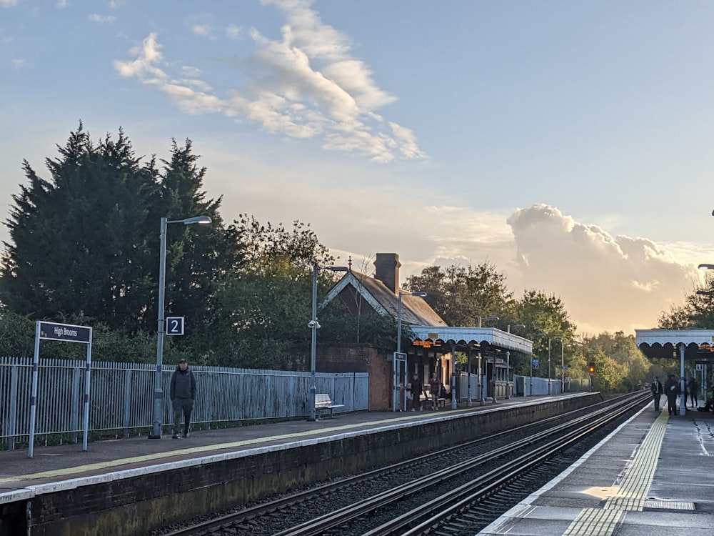 a train station with people