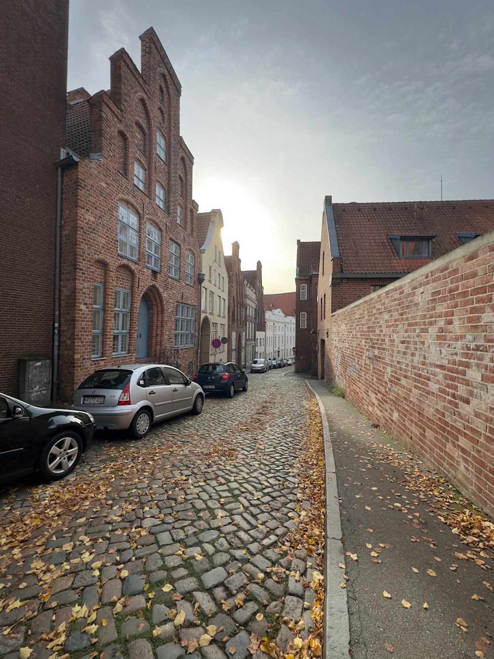 a street with cars parked along it