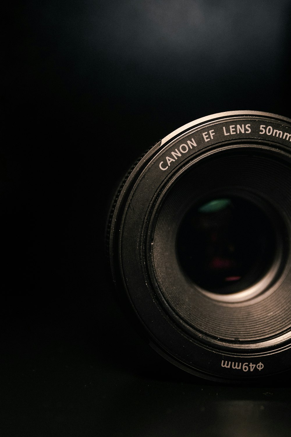 a camera lens with a green light