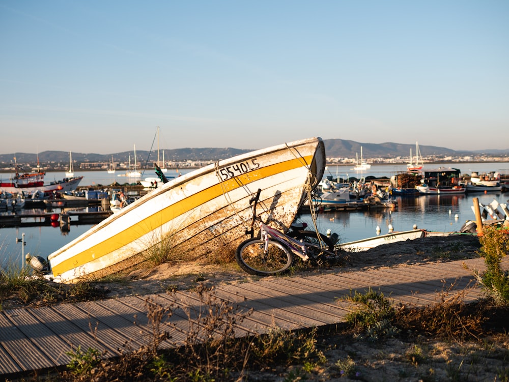 a boat is parked on the shore