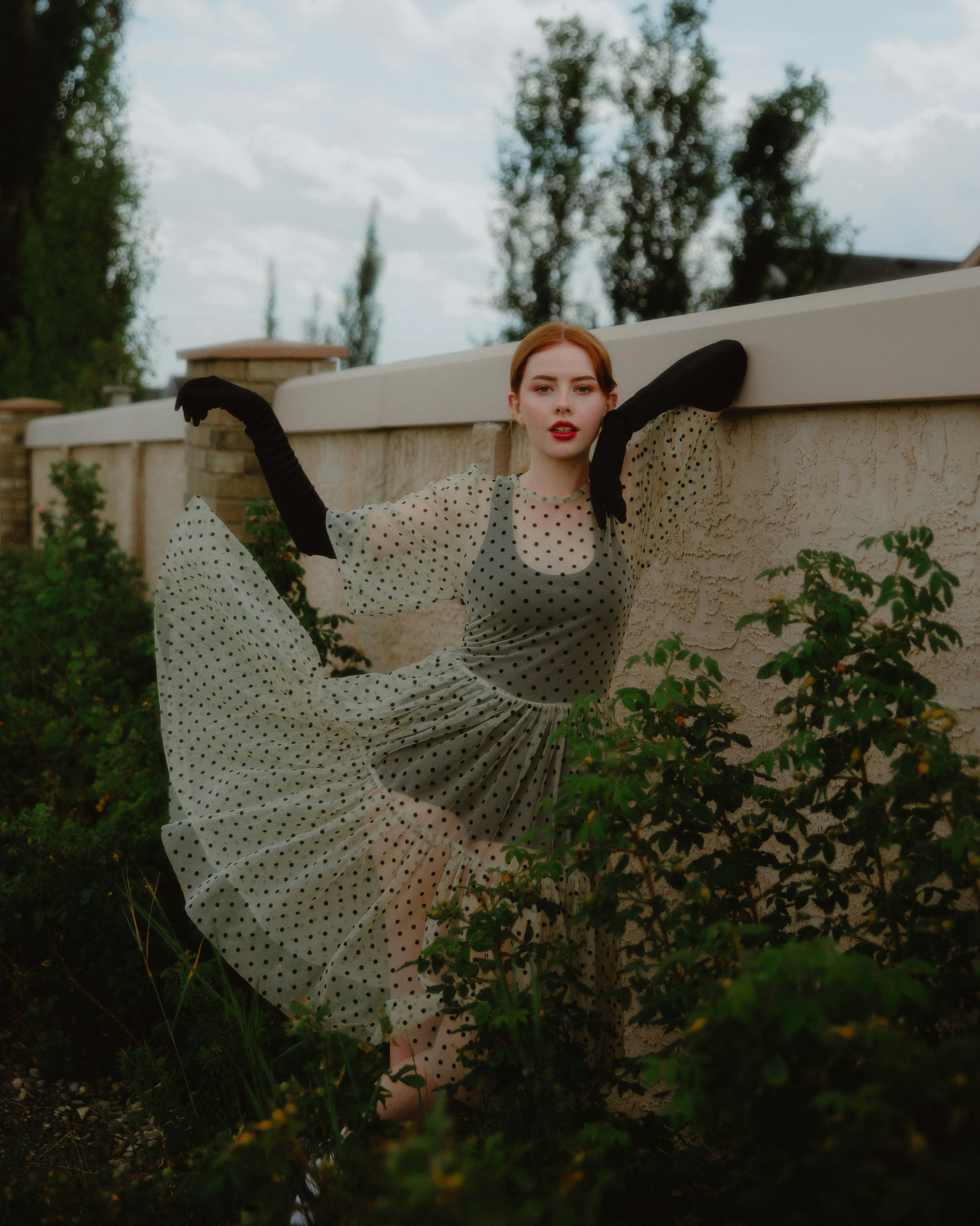 A stylish woman posing in seasonal wear