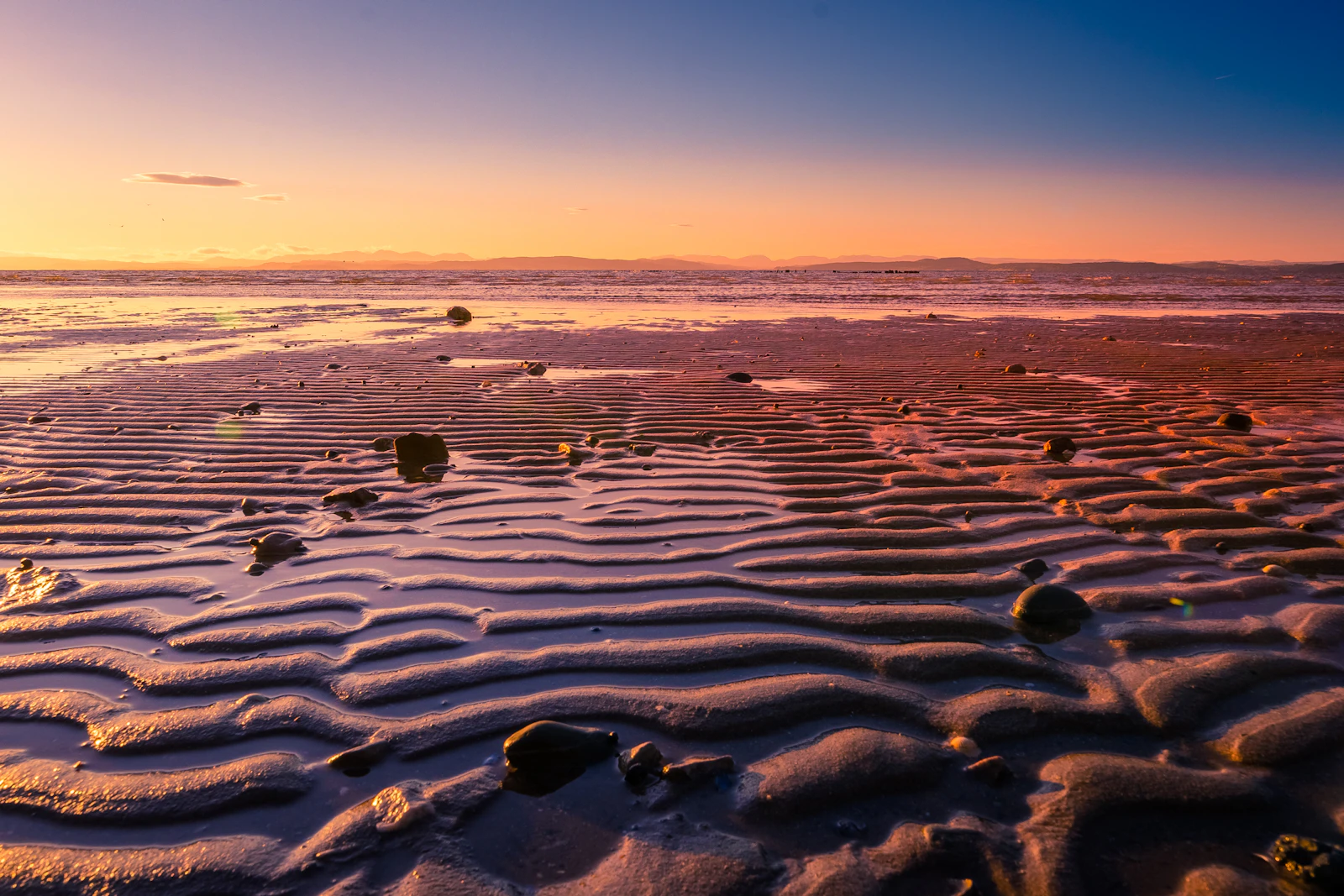 Morecambe Bay shoreline and sands in the evening light