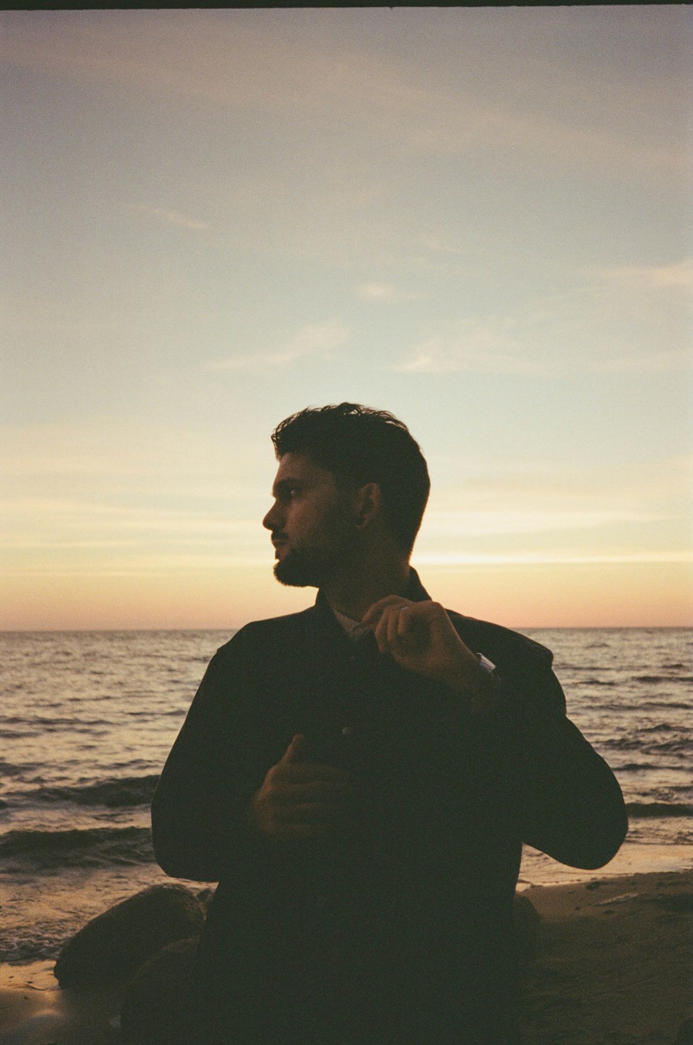 a man standing on a beach