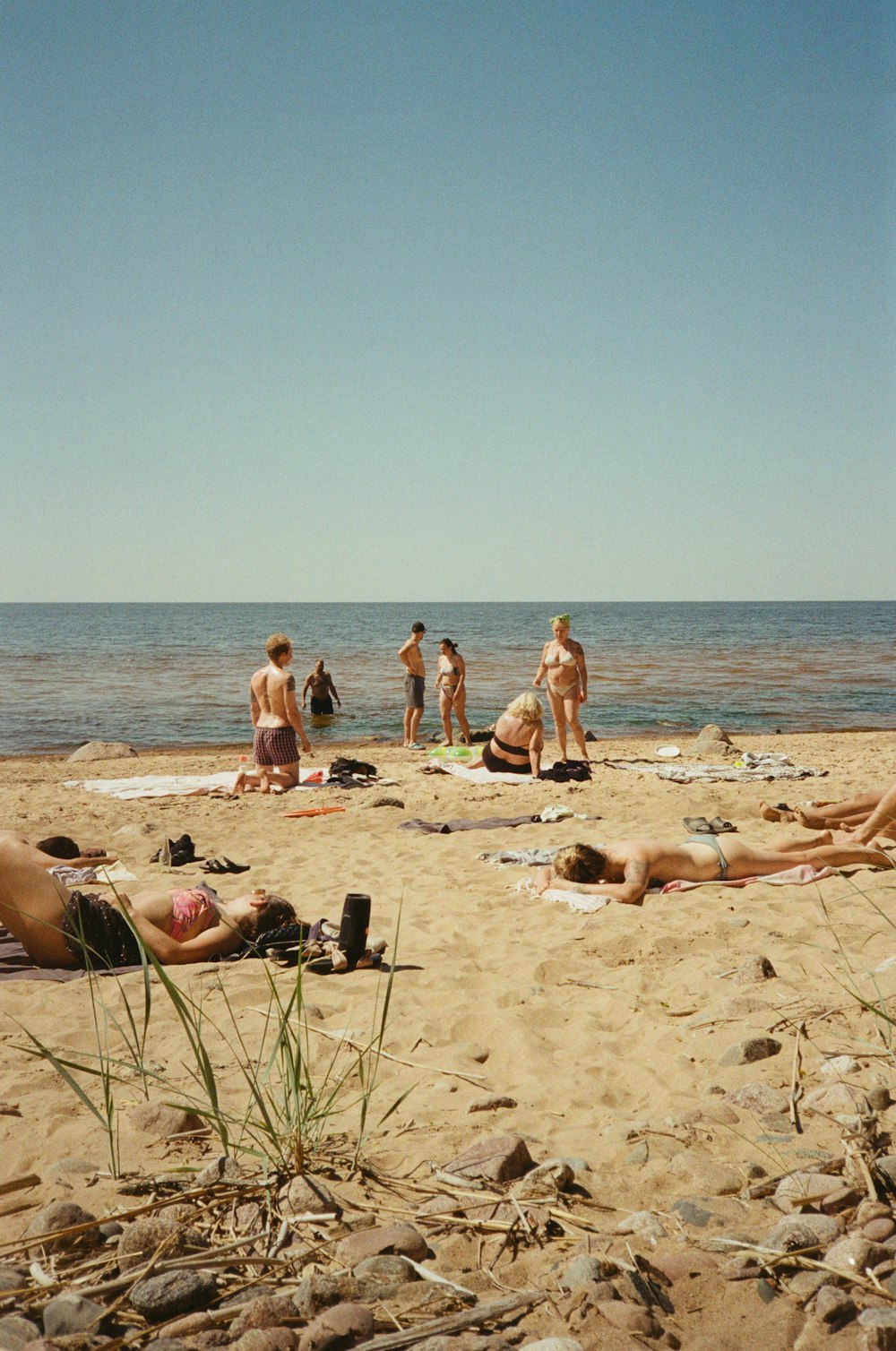 a group of people on a beach