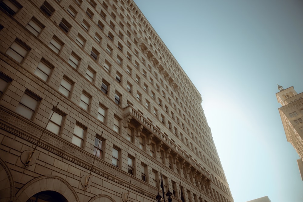 a tall building with a blue sky