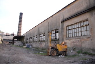 a large building with a large truck in front of it
