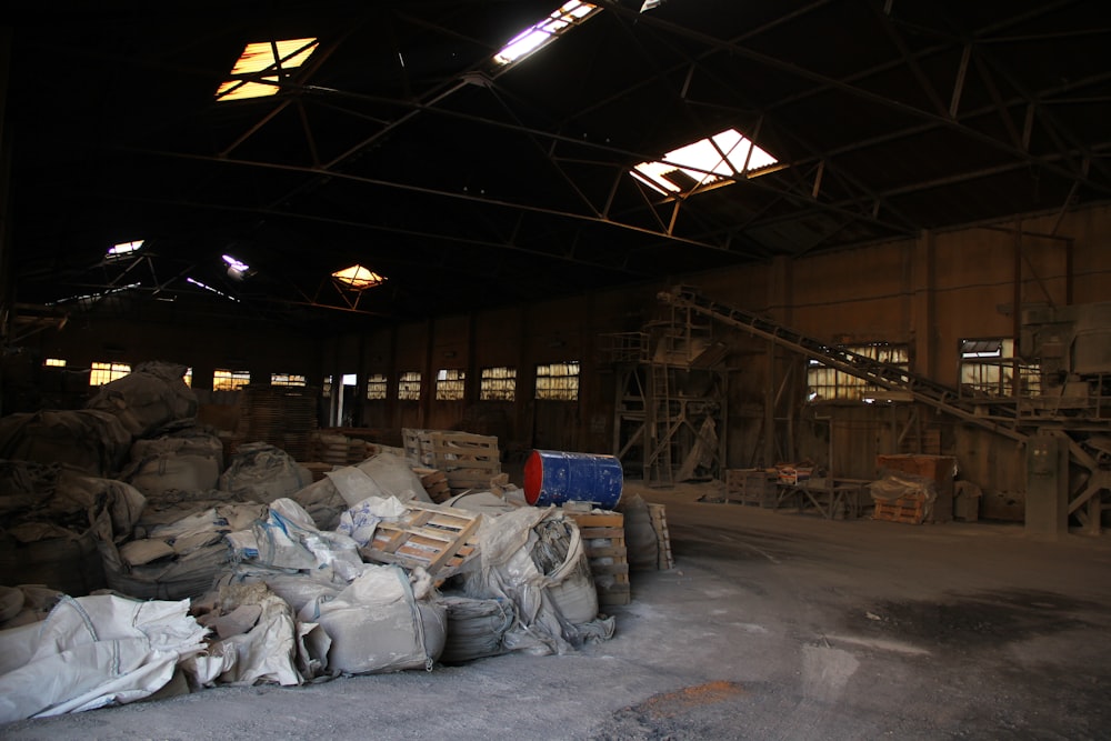 a warehouse with stacks of wood