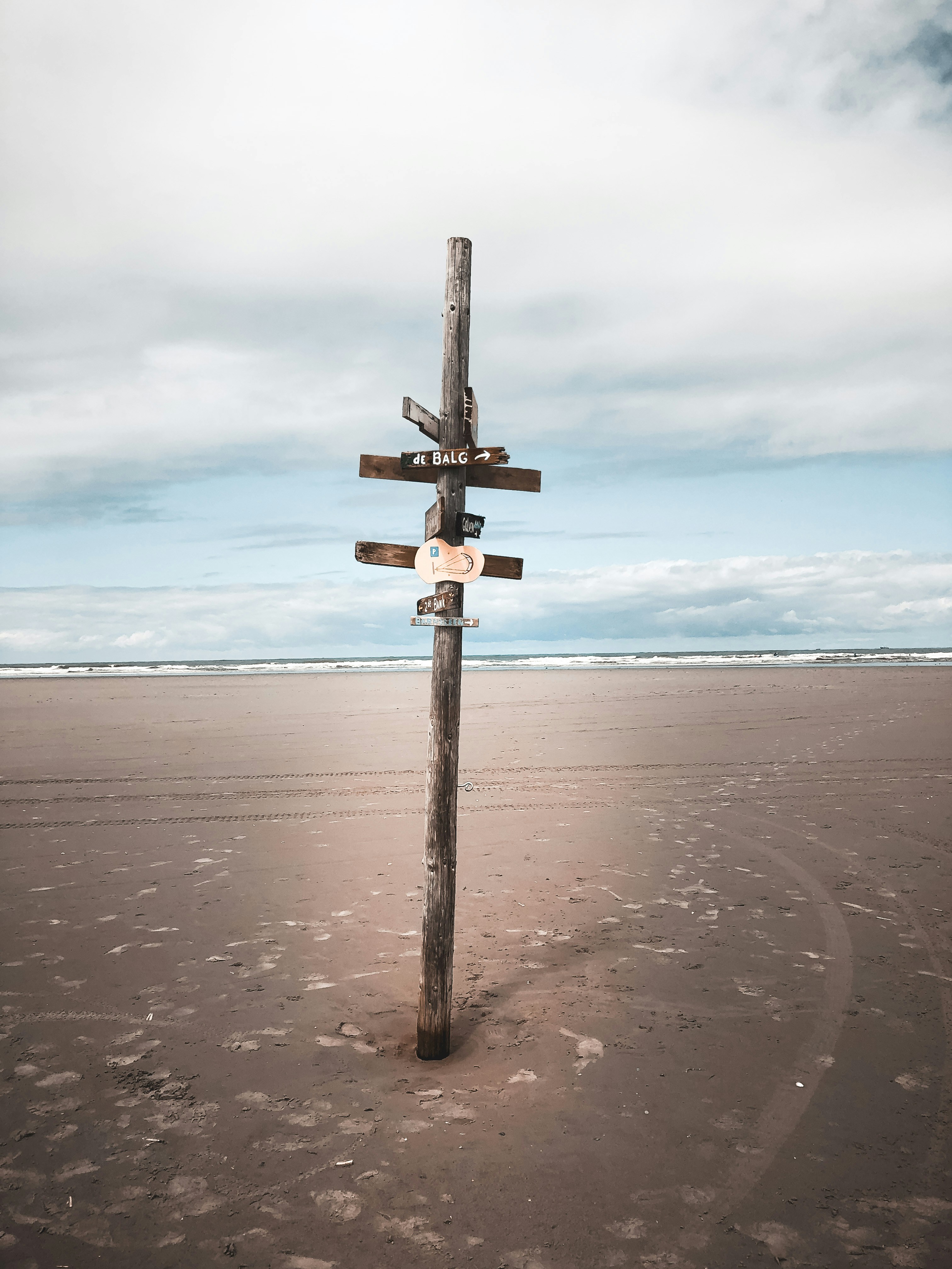 a cross on a beach