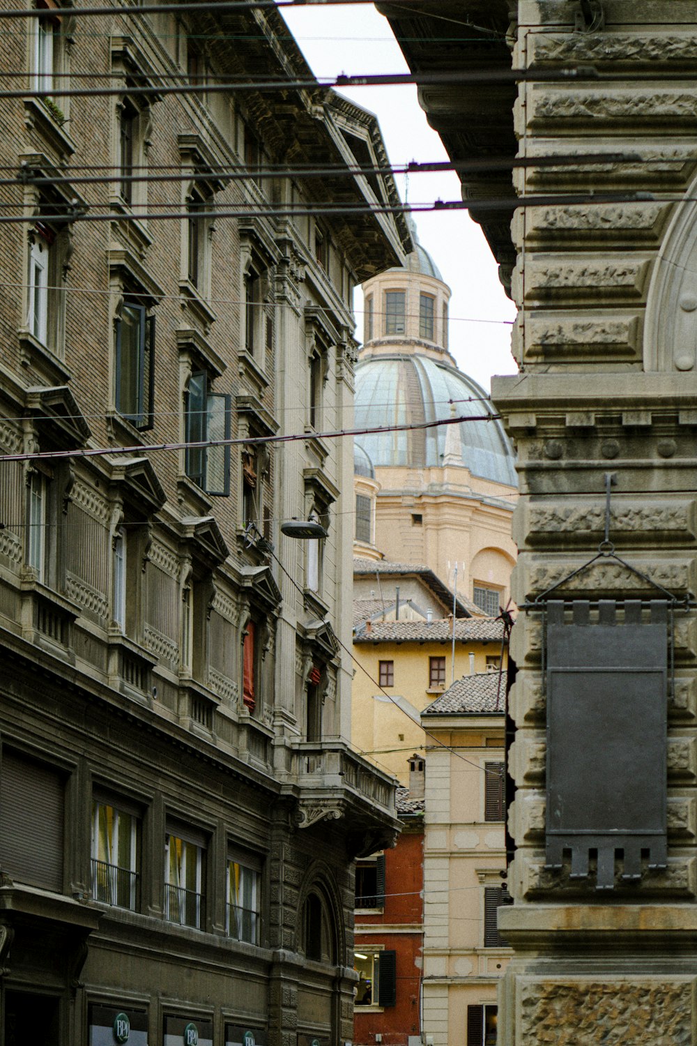 a group of buildings with a dome