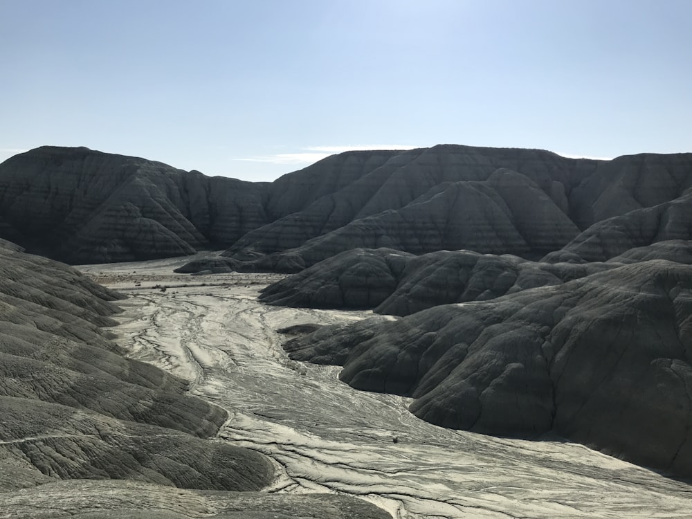 a rocky landscape with a blue sky