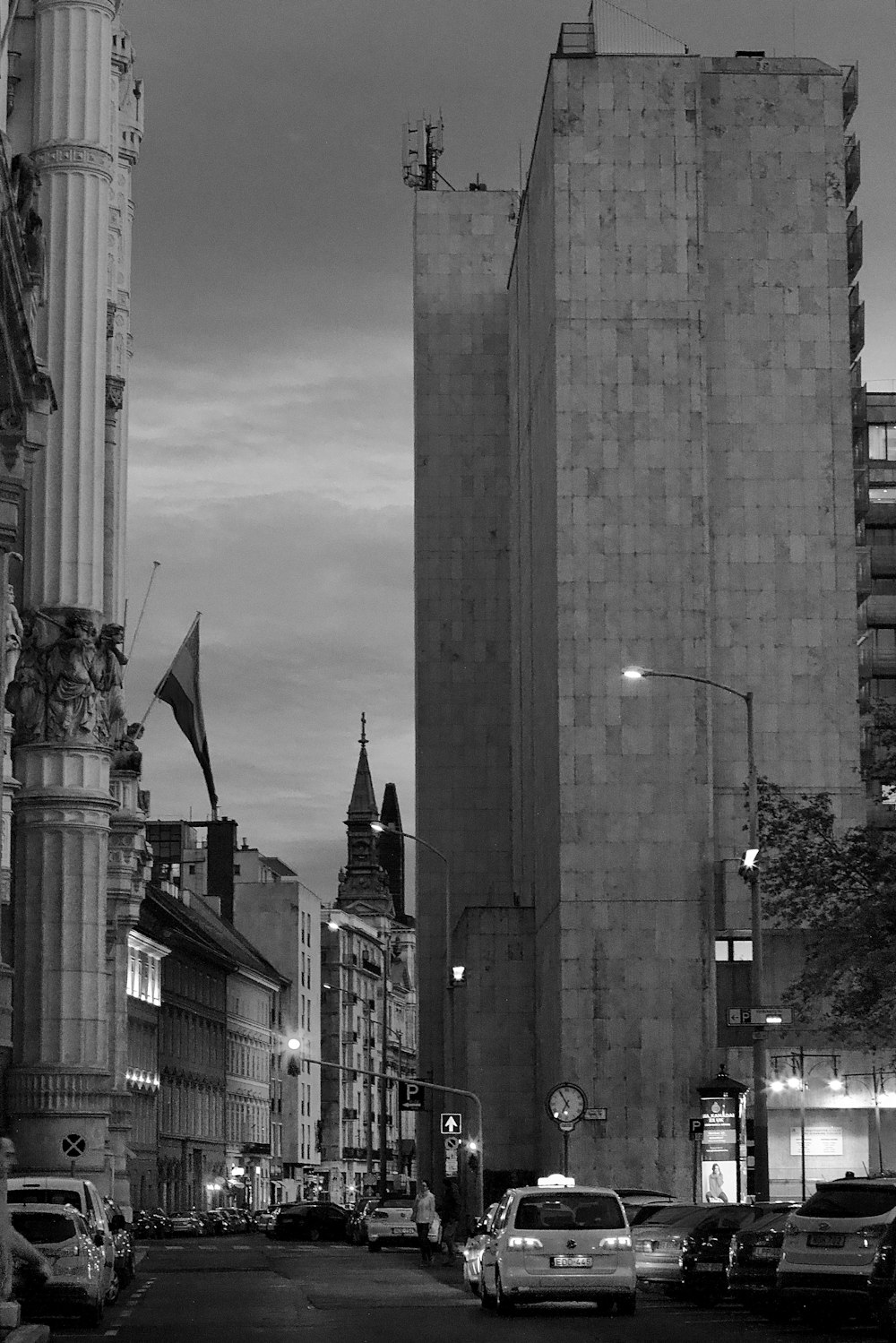 a city street with tall buildings