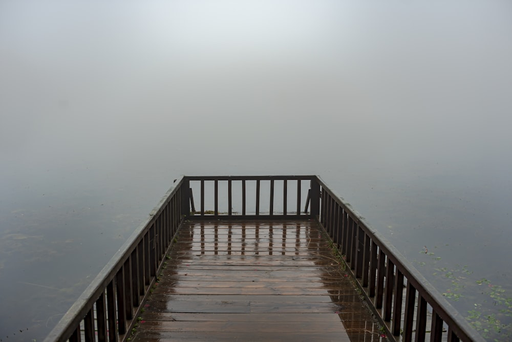 a wooden bridge over water