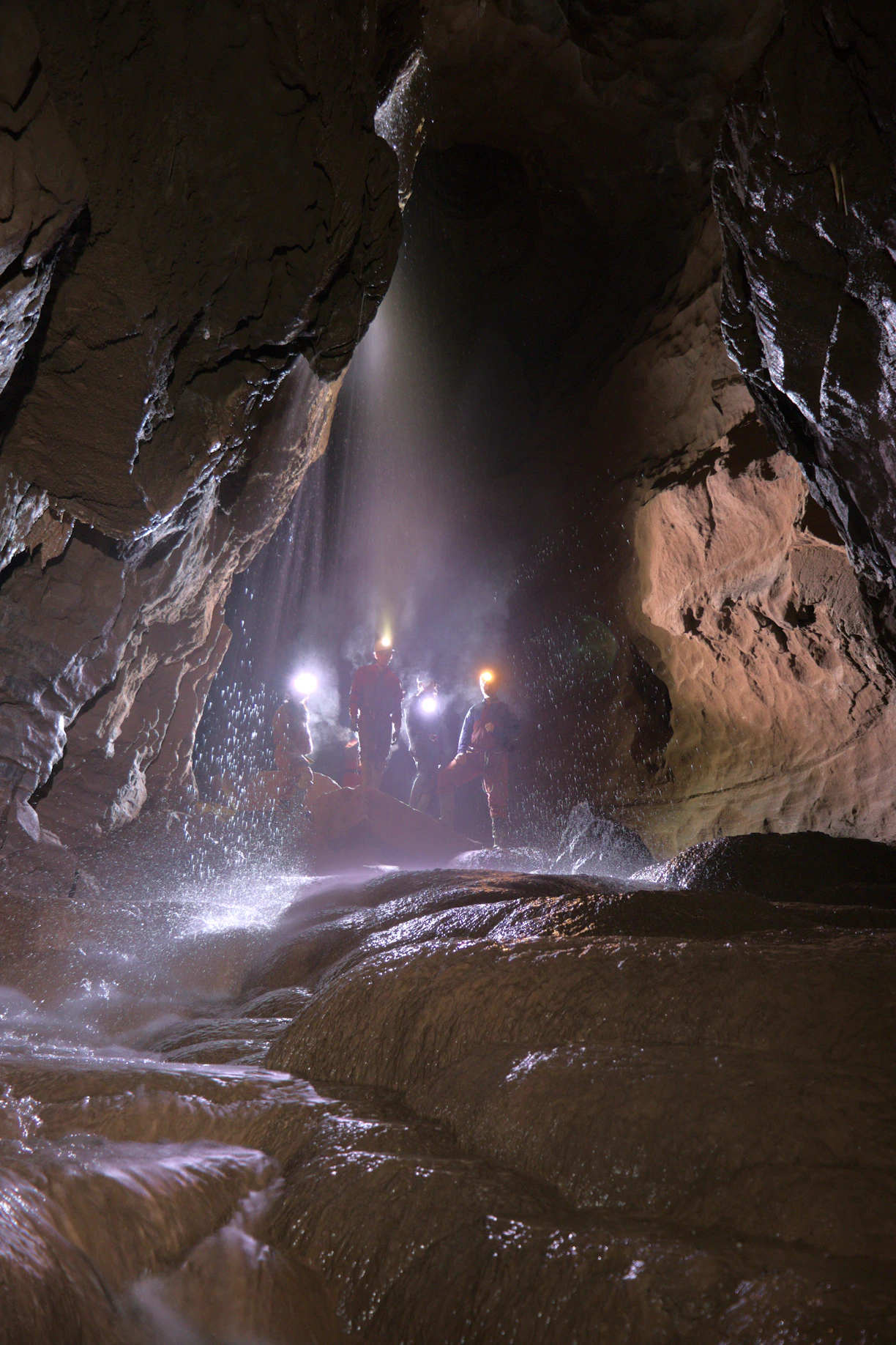 a person standing in a cave