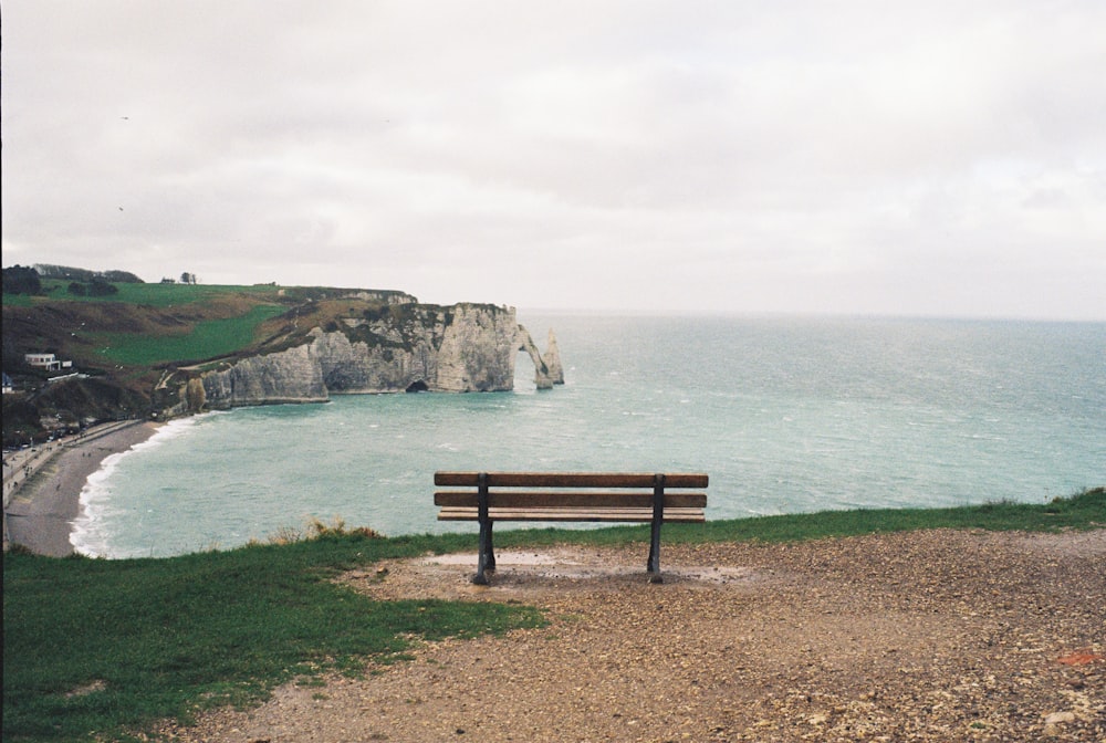 a bench overlooking a beach