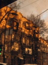 A peaceful city hall building bathed in warm morning light, symbolizing community focus.