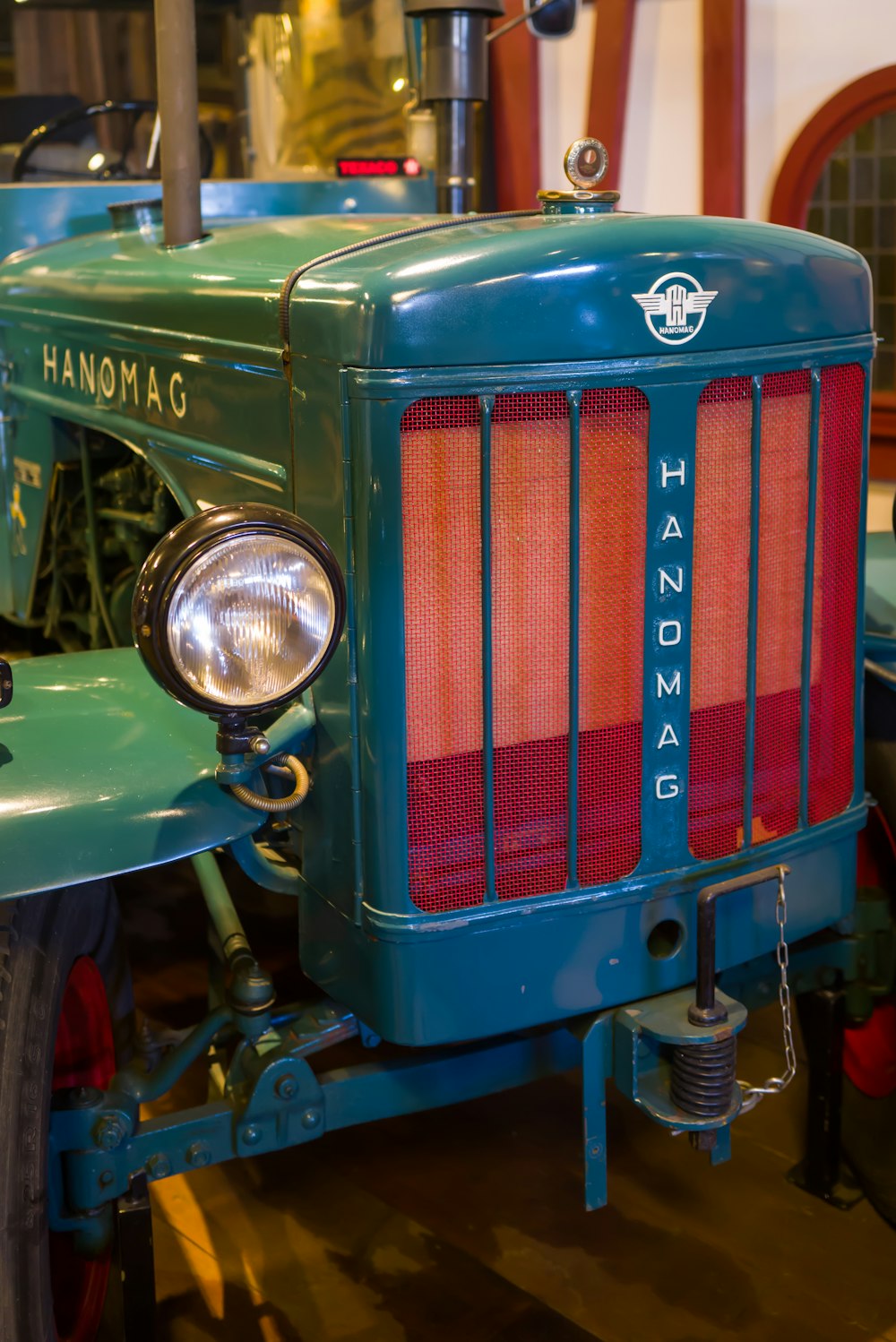 a green and red tractor