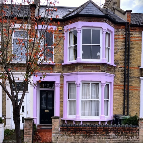 a house with a tree in front