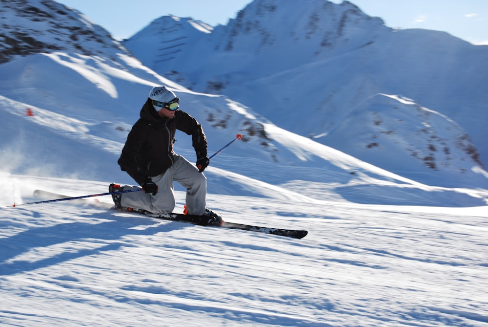 a man skiing down a mountain