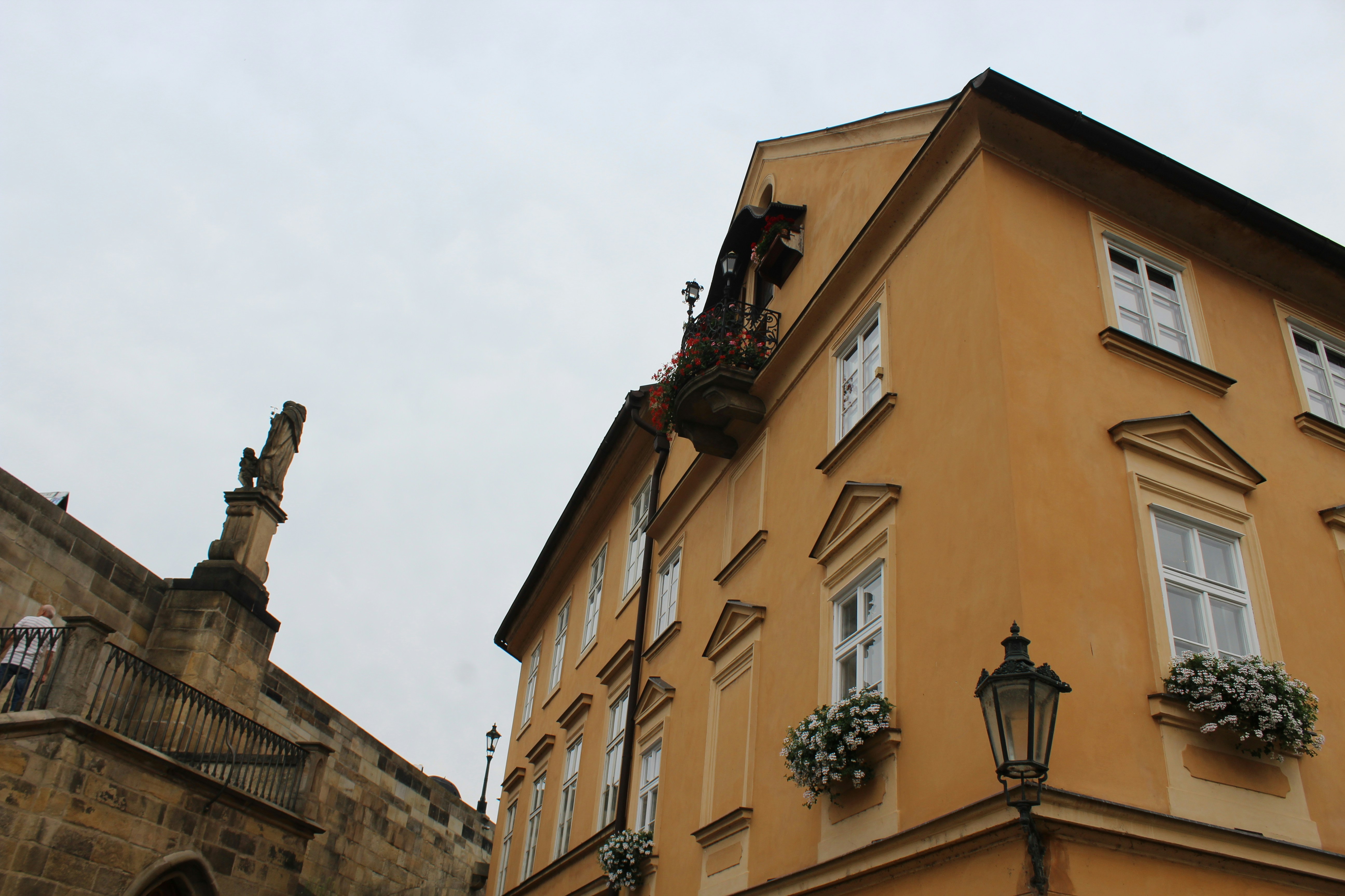 a building with a statue on the roof
