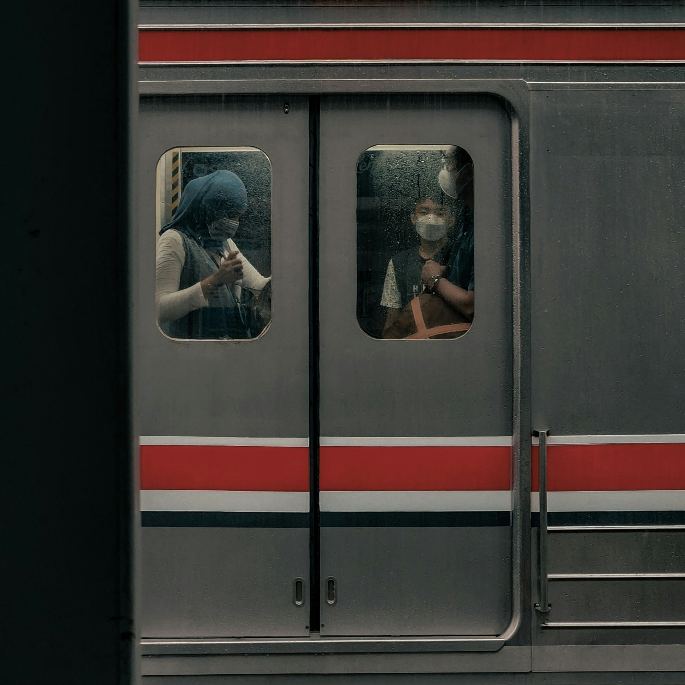 a person taking a picture of himself in a mirror