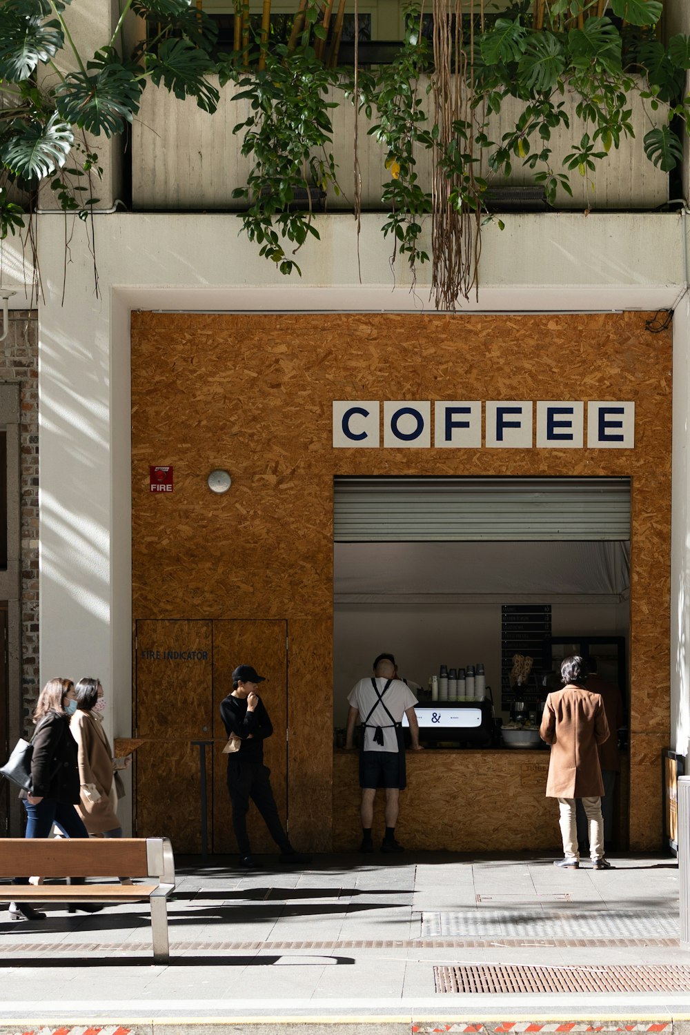 a group of people standing outside a building