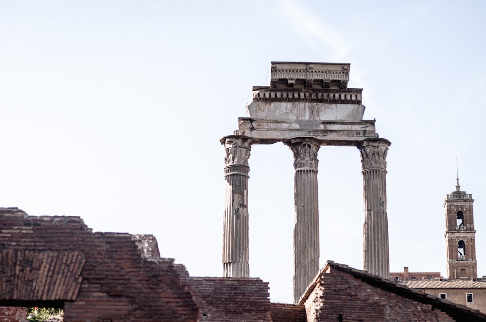 a large stone structure with pillars