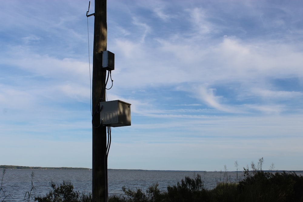 a power line with a box attached to it