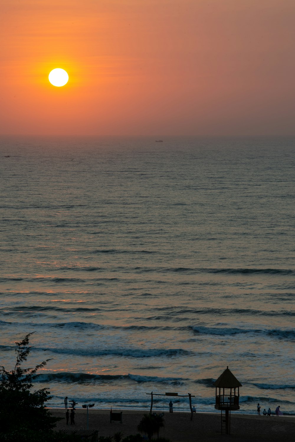 a sunset over a beach