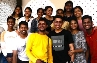 a group of people posing for a photo