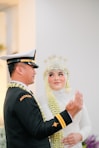 a man and woman in formal attire