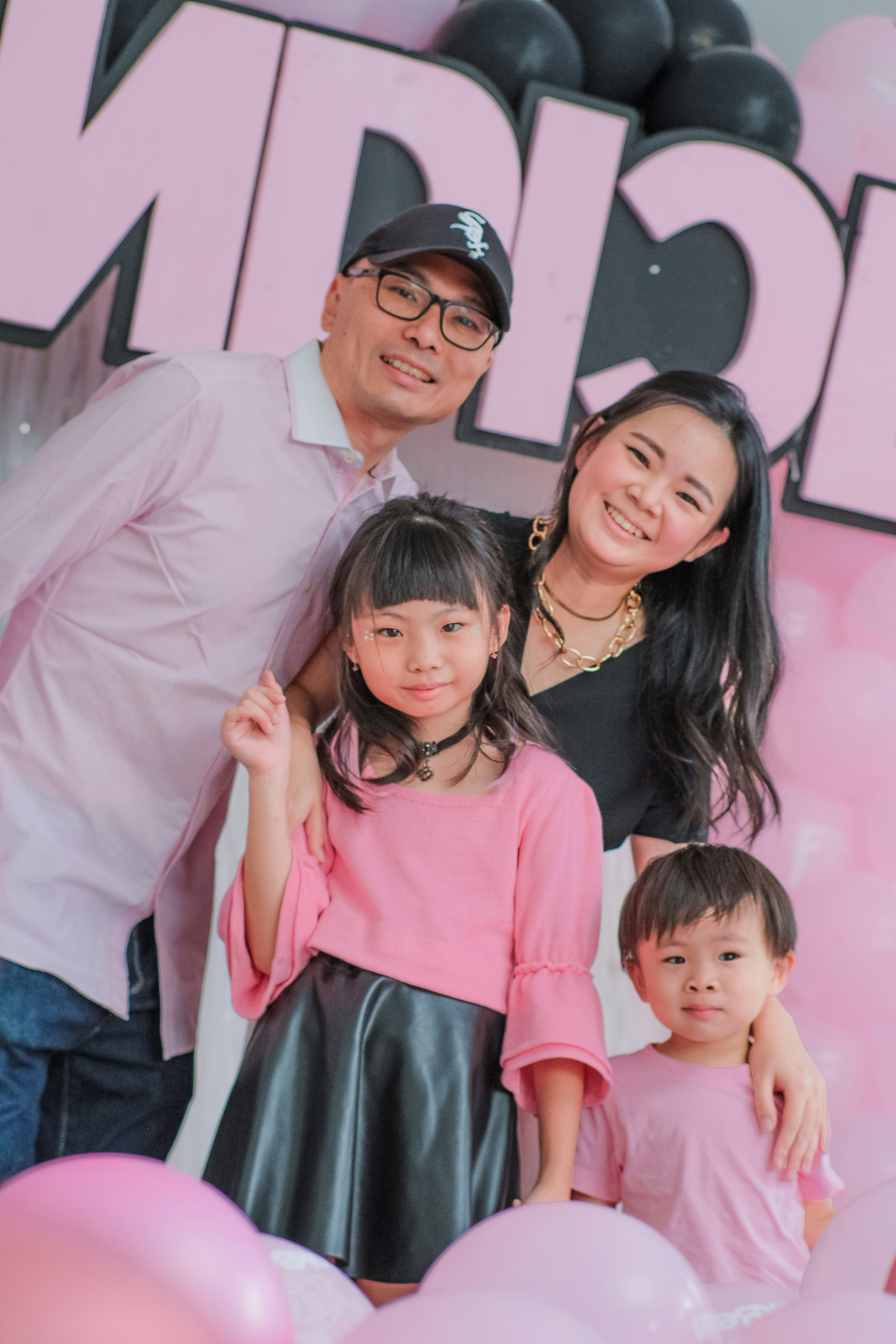 a man and woman with children