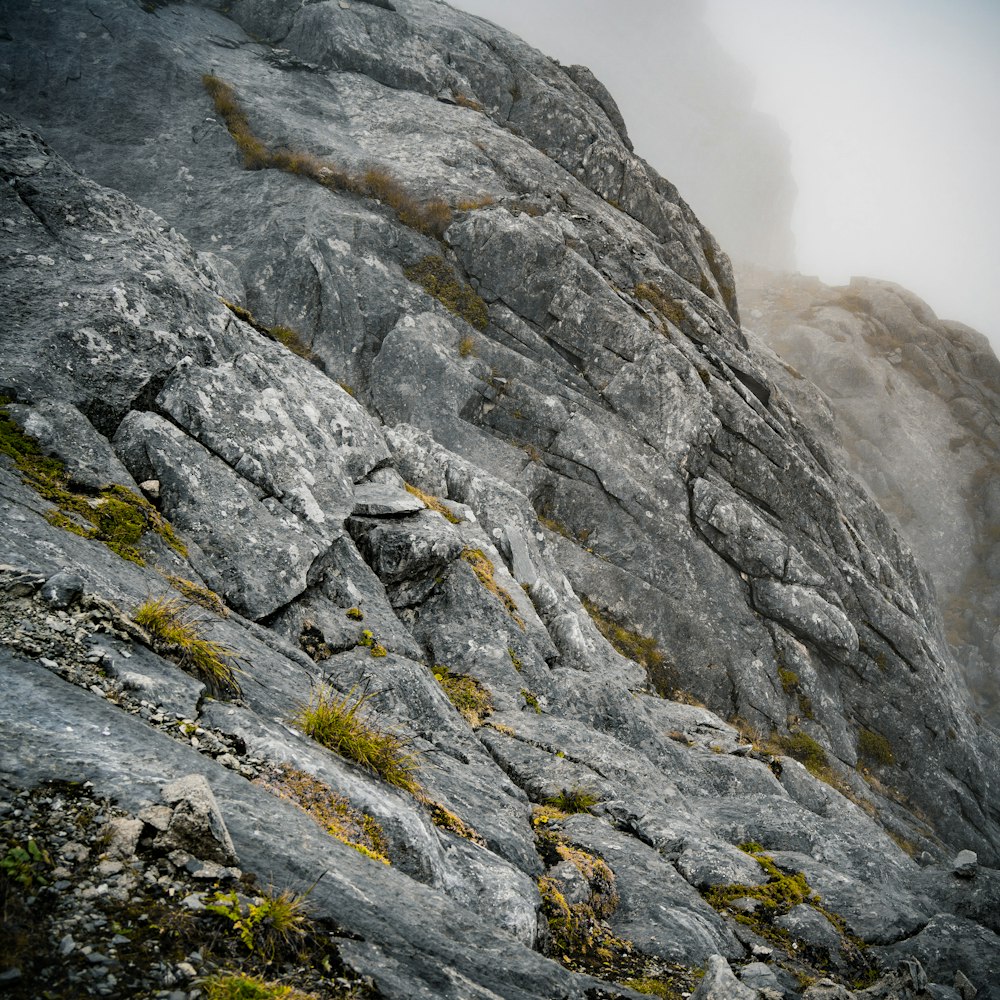 a rocky mountain with moss