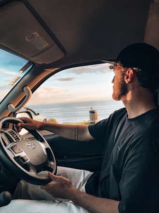 a man driving a car