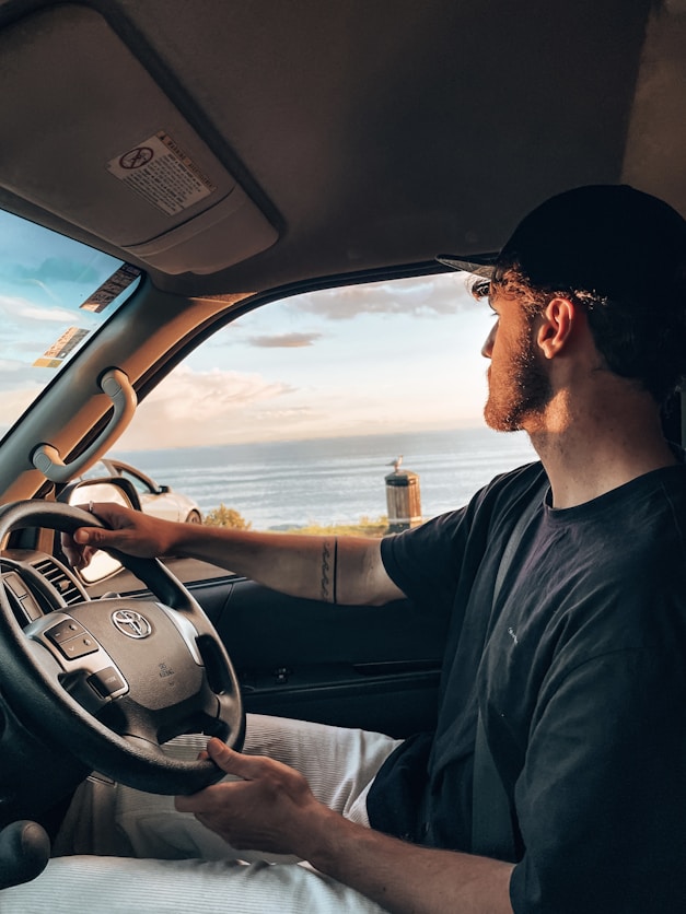 a man driving a car