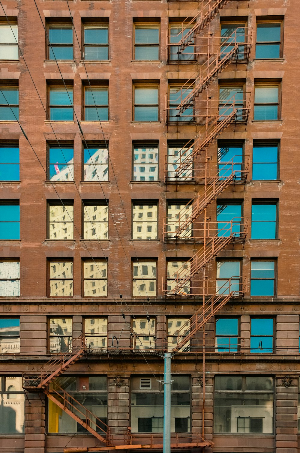 a building with windows and a ladder