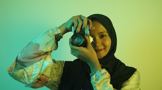 a person holding a camera