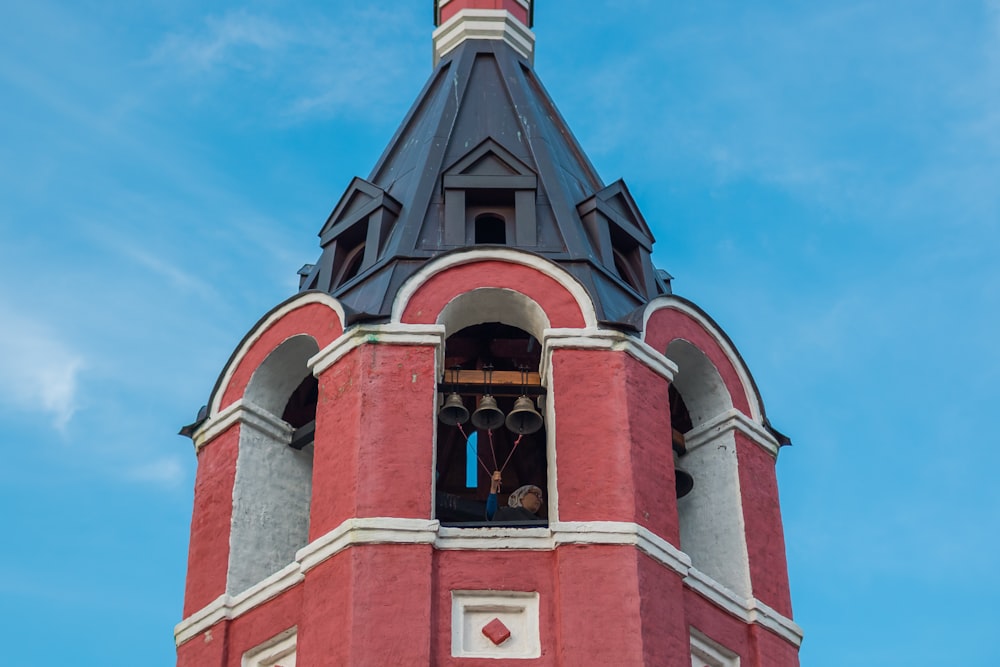 a group of people in a window of a building