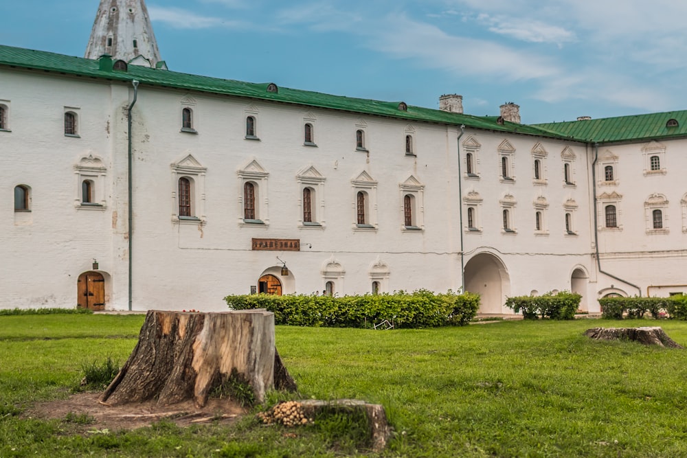 a building with a grass yard