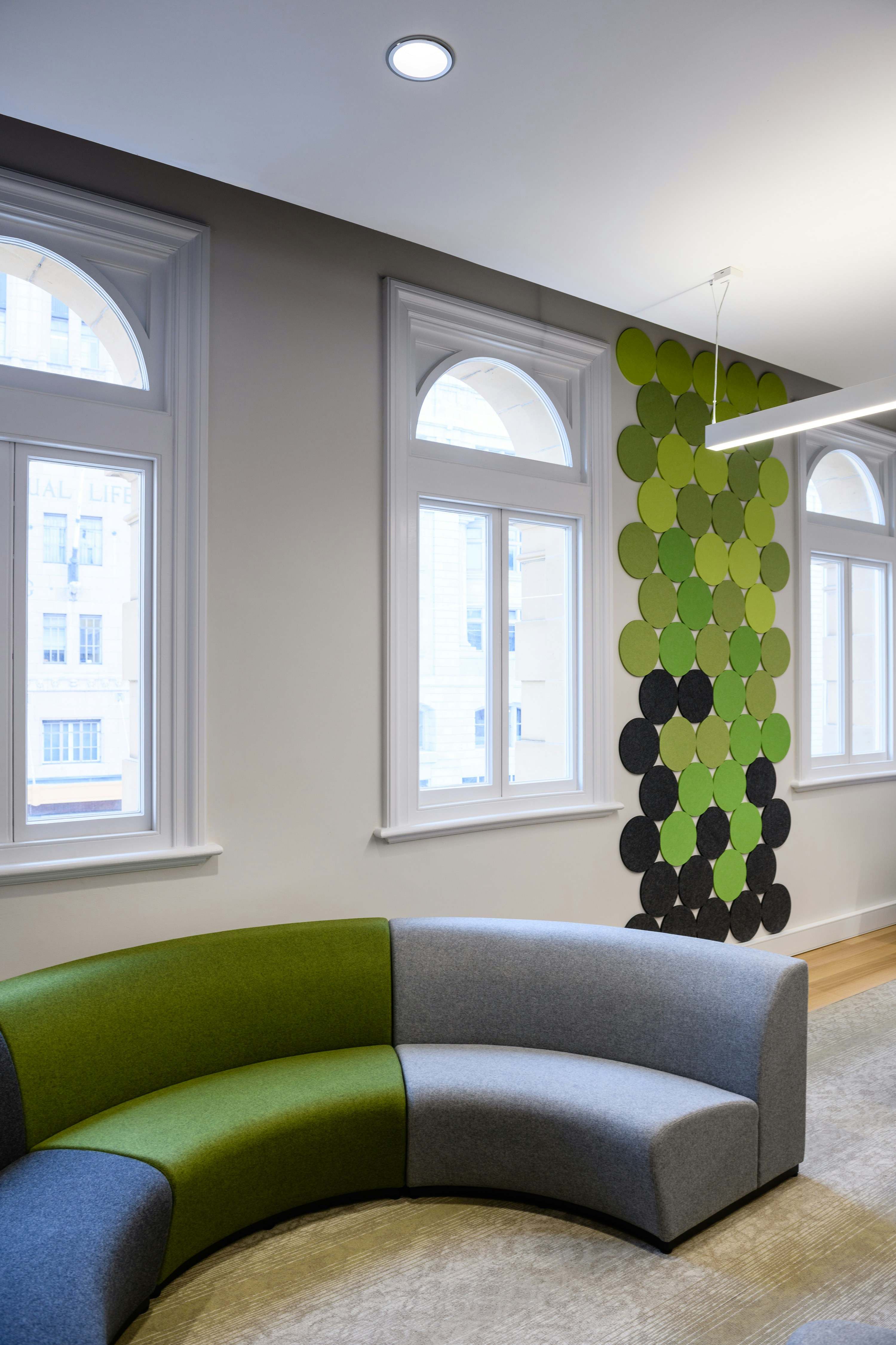 a green couch in a room