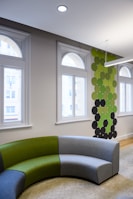 a green couch in a room