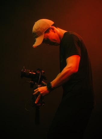 a man holding a camera