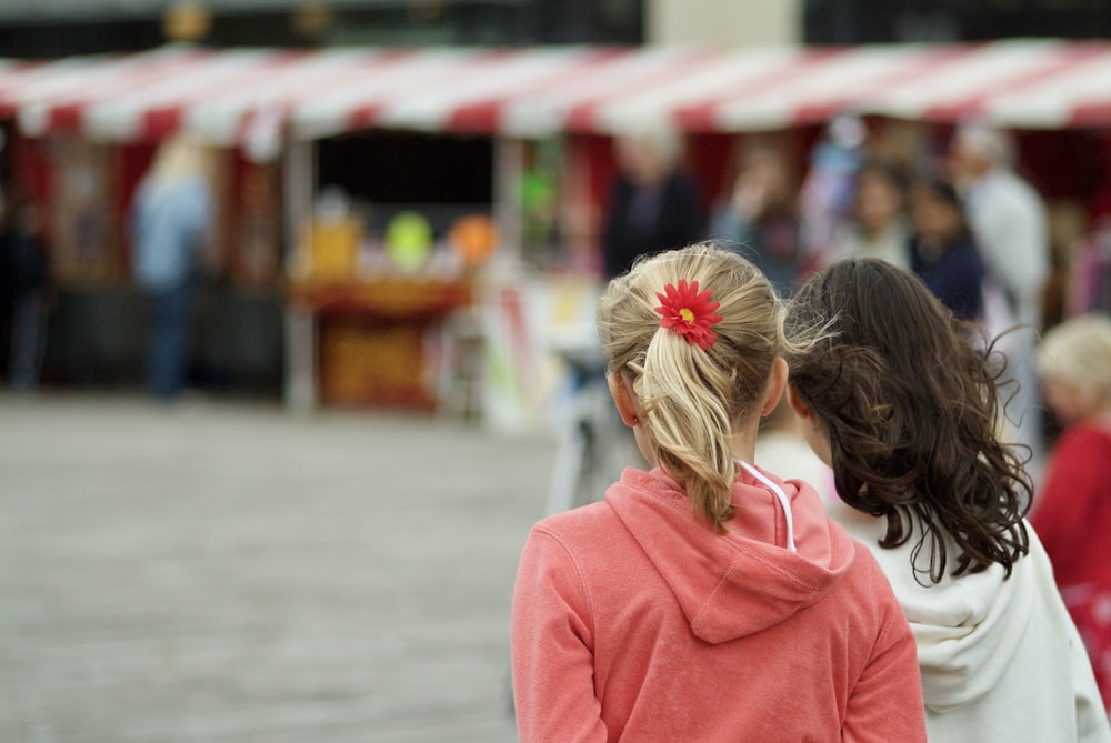 a couple of girls facing each other