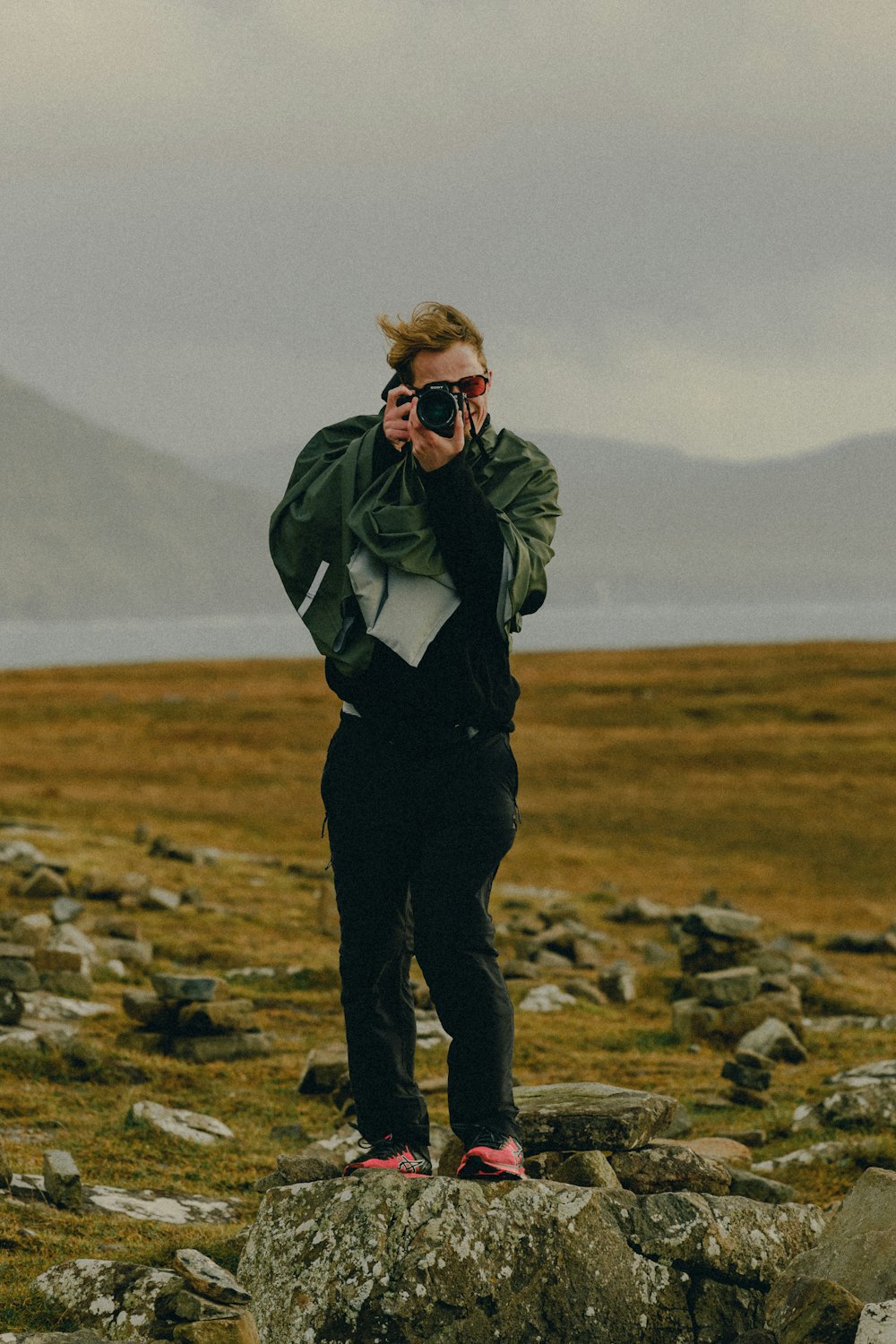 a man holding a camera