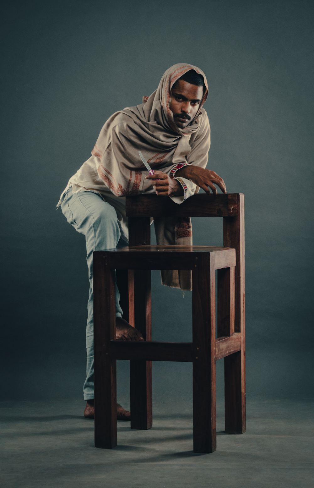 a man sitting on a chair