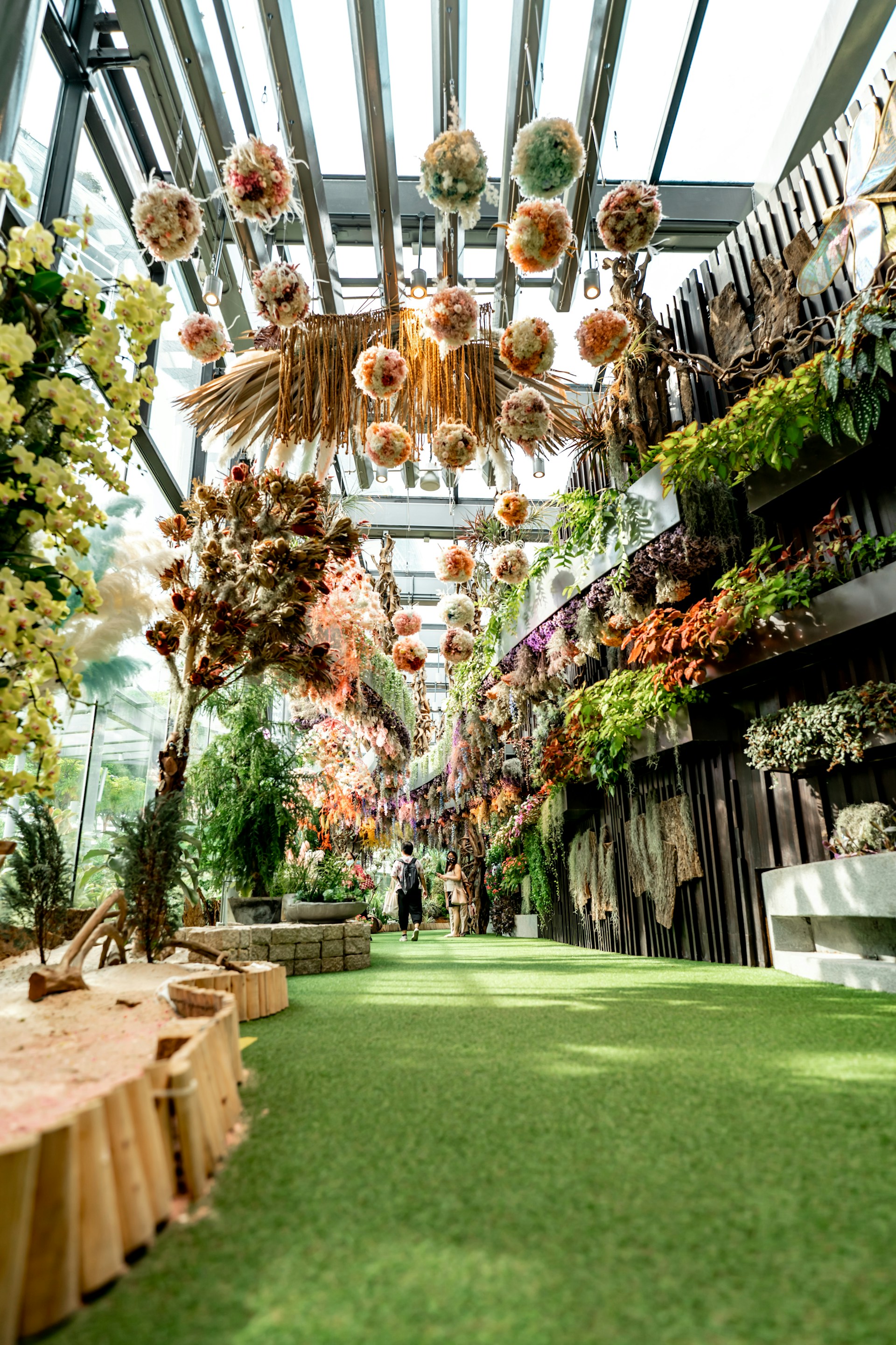 a large room with a large display of flowers